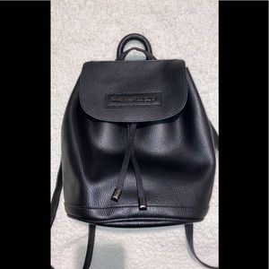 A black mini backpack